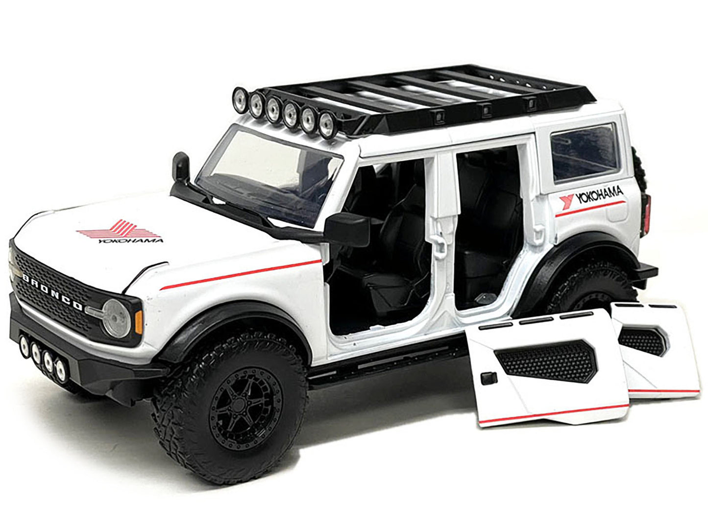 2021 Ford Bronco White with Red Stripes and Roof Rack "Yokohama Tires" "Just Trucks" Series 1/24 Diecast Model Car by Jada